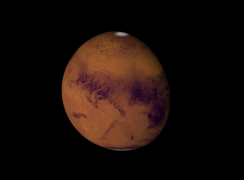 Így fog kinézni a Mars 2021.01.22-én, 21:00 órakor. A Syrtis Major (jobbra lent) hatalmas sötét alakzata markánsan látszik majd, de a kibukkanó Hellas medence is (jobbra fent) látszani fog. Forrás: WinJupos